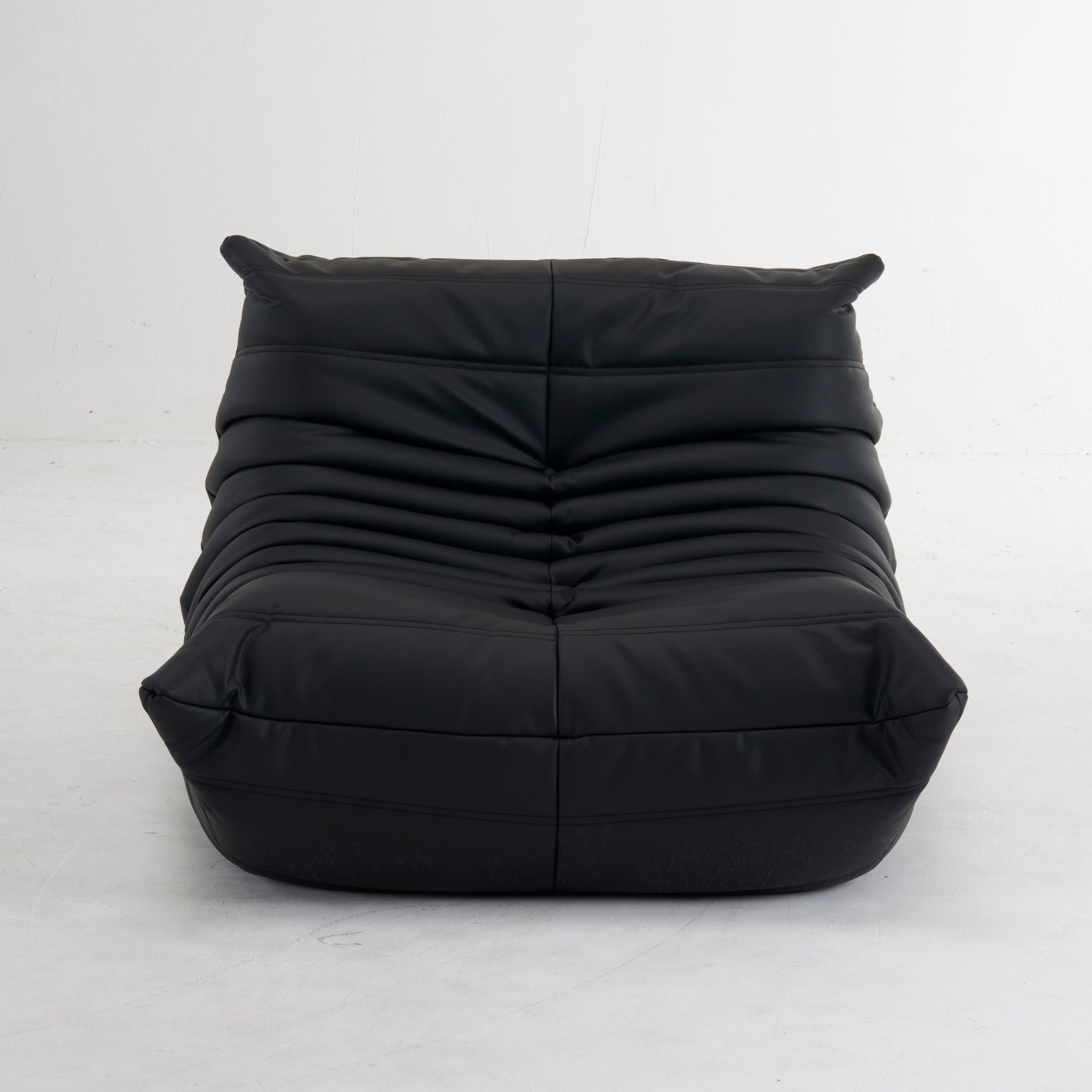 Black bean bag chair on a white background