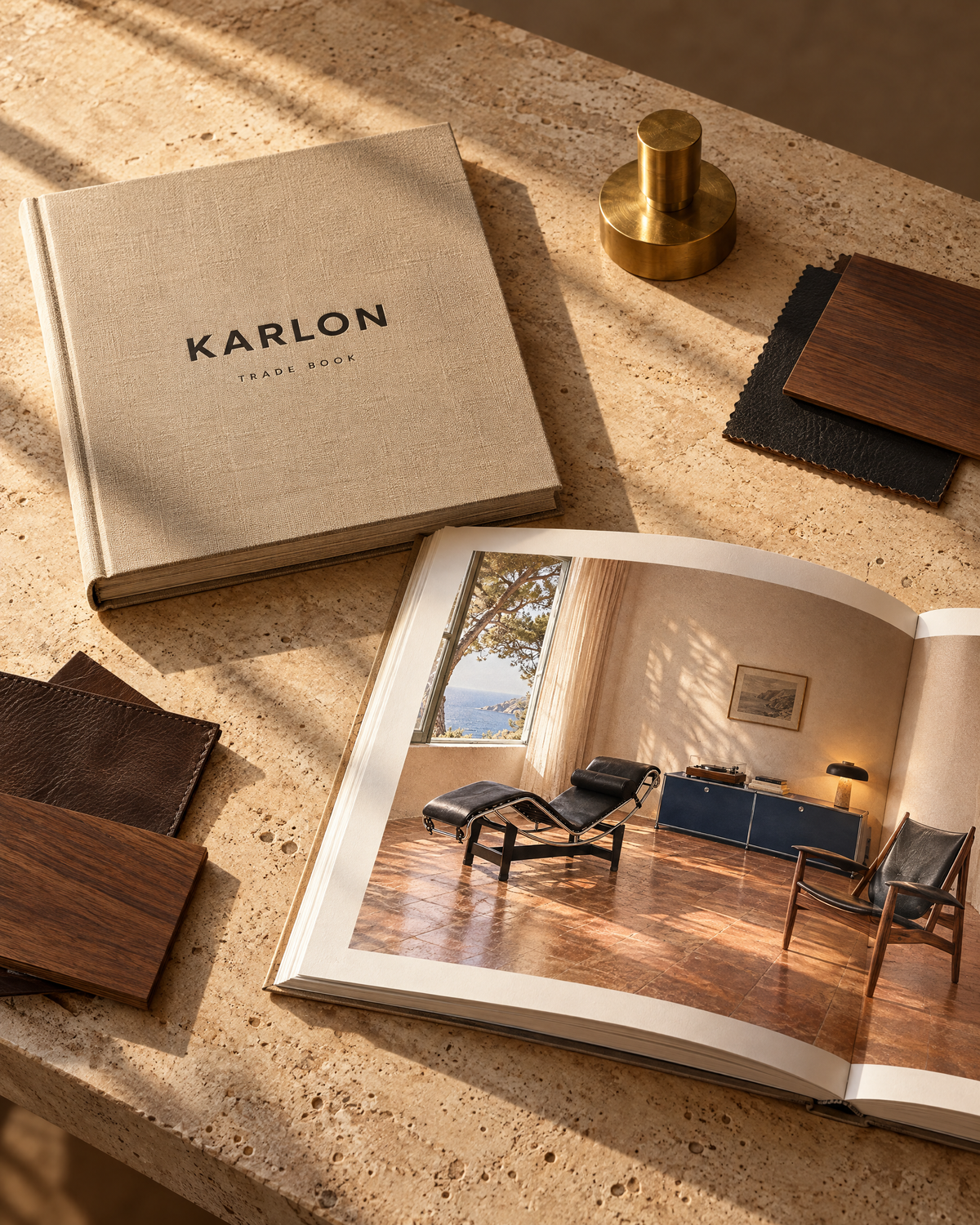 The Karlon Trade Book in linen next to an open copy